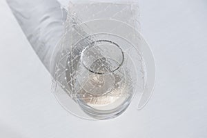 Different types of gelatin powder and sheets on white table