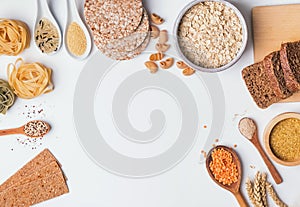 Different types of high carbohydrate food on the white background