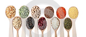 Different types of legumes and cereals on background, top view. Organic grains