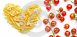 Different types of pasta with cherry tomatoes on white background