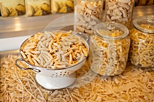 Different types of pasta. Many sorts of raw pasta in a cafe, food banner