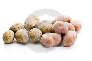 Different types of potatoes on white background