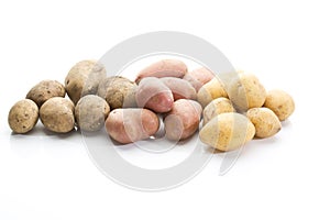 Different types of potatoes on white background