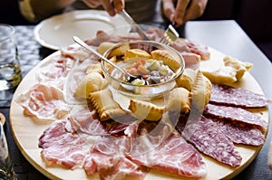 Different types of prosciutto and salami