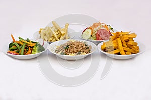 5 different types of salads: Sweet potatoes (camote o kumara), fried rice (arroz chaufa), potatoes photo