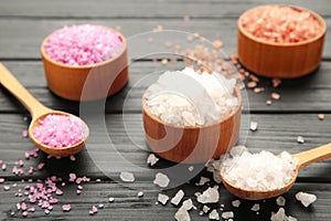 Different types of salt on black background