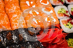 Different types of Sushi and red ginger close-up