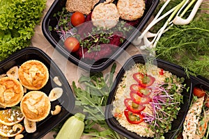 Different types of takeaway food in microwavable containers