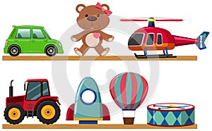 Different types of toys on wooden shelves