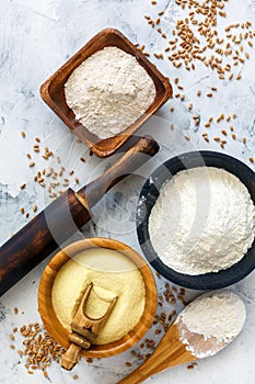 Different types of wheat flour and wheat grain.