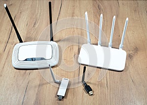 Different types of Wi-Fi routers, modern and old technology. Wireless ethernet connection signal. USB Wifi Receiver Wireless