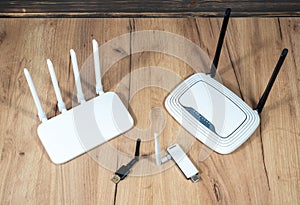 Different types of Wi-Fi routers, modern and old technology. Wireless ethernet connection signal. USB Wifi Receiver Wireless