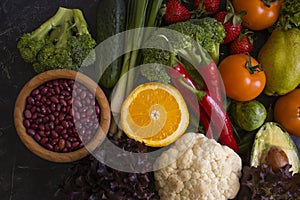 Different vegetables, fruits, cereals assortment the old background