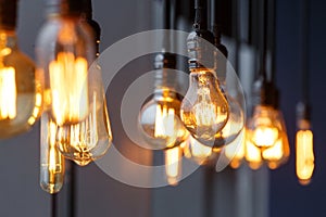 Different vintage tungsten filament lamps hanging from the ceilin