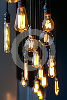 Different vintage tungsten filament lamps hanging from the ceiling