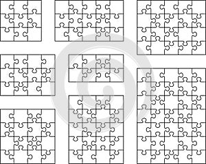 different white puzzles, separate pieces