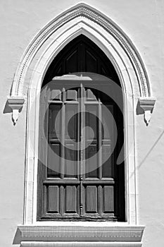 Different windows in old facades photo