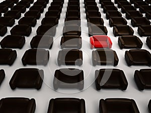 Differentiation concept with red armchair photo