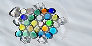 Differently colored glass round crystals