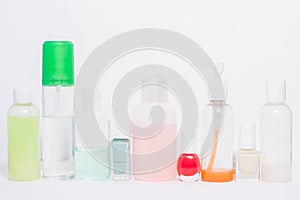 Differently shaped clear cosmetic bottles