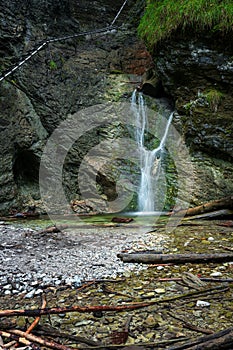 Difficul trail with ladder near the waterfall in canyon of National park Slovak paradise