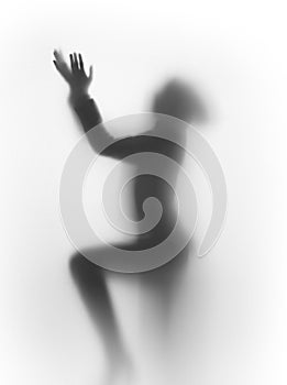 Diffuse silhouette of a praying human