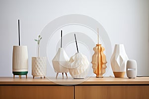 diffusers in various shapes and sizes placed side by side