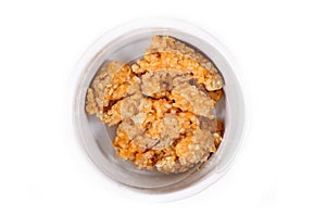 Digestible light food for dogs with digestive health problems consisiting of bowl with cooked chicken meat, rice and carrots