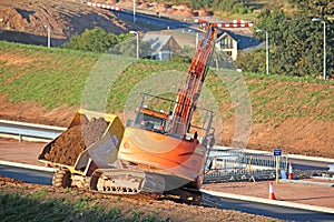 Digger on a road construction site