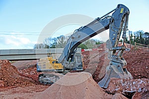 Digger on a road construction site