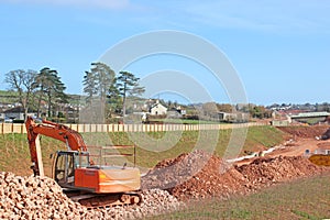 Digger on a road construction site