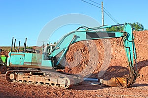 Digger on a road construction site