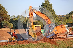 Digger on a road construction site