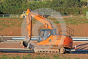 Digger on a road construction site