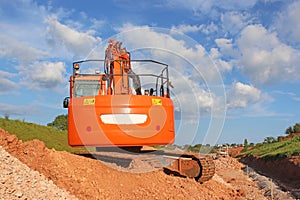 Digger on a road construction site