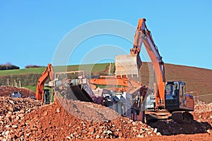 Digger and stone crusher