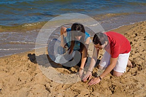 Digging on the beach