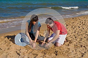 Digging on the beach