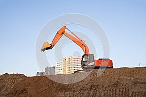 Digging the pit foundation a hole with excavator