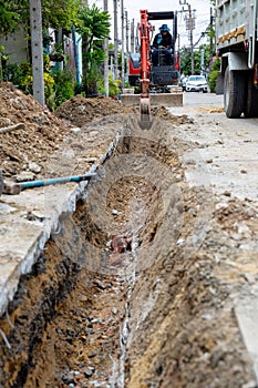 Digging road before install Pipe Water. Excavation water drainage at construction site. Digging roads to lay pipes 8 inches. The r