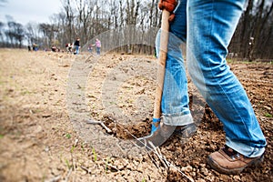 Digging soil using a shovel