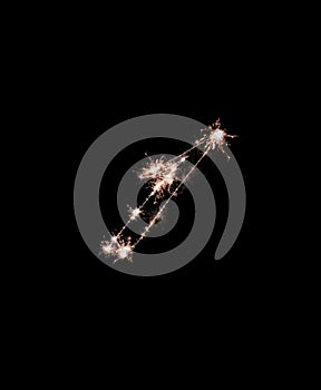 The digit 1 made from sparks of Bengal lights isolated on a black background