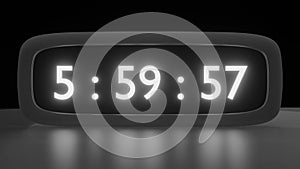 Digital alarm clock with black and white clockface waking up at 6 AM. The numbers on the clock screen changes from 5:55