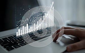 Digital Analytics Visualization on Laptop with Hand Interacting with Data Graphs and Charts Representing Financial