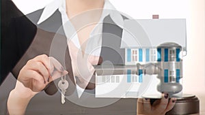 Digital animation of female real estate agent holding the house key