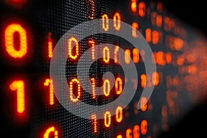 Digital binary code display with glowing red and orange circuit patterns