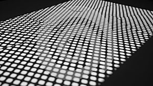 Digital binary code wave pattern in blue and white on black background technology concept