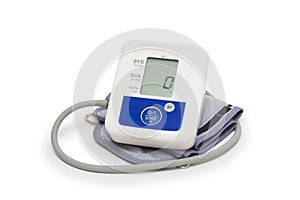 Digital blood pressure meter with love heart symbol on white background