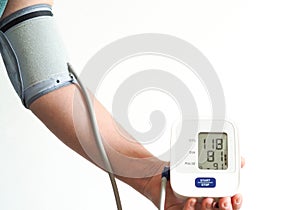 Digital blood pressure monitor with arm blood pressure measurement and white background