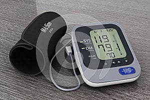 Digital Blood Pressure Monitor with Cuff. 3d Rendering